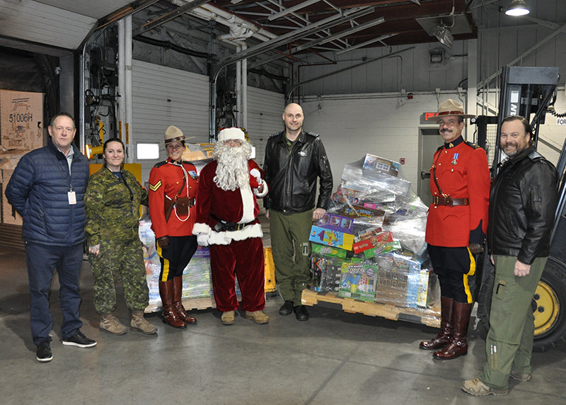 Toys for the north charity: toys on a pallet to be distributed to 1000's of kids in need in the northern regoins. Santa, 2 RCMP officers and other support volunteers have made this effort a bigger success than ever before.